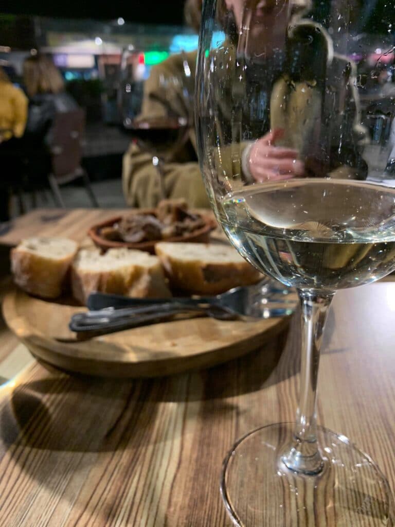 White wine and a tapa are the best companions to make Spanish friends.